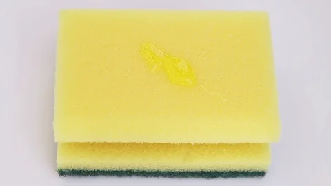 Pouring Detergent On A Sponge For Dishes Stock Footage 88901480