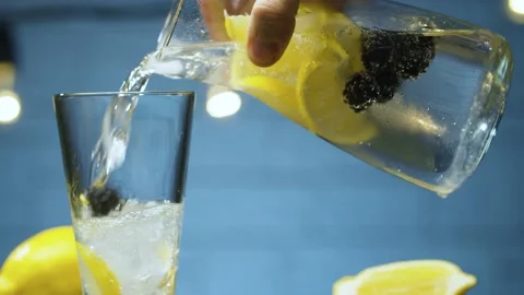 Pouring dewberry lemonade Stock Footage 143094415