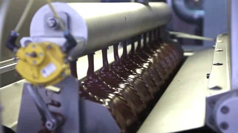 Pouring down chocolate Stock Footage 48775481