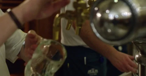 Pouring draft beer 4k slow motion Stock Footage 71574851