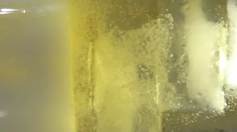 Pouring drink on ice Vídeos de archivo 48978675