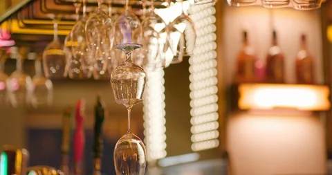 Pouring drink over a stack of glasses in flames Stock Footage 106179023