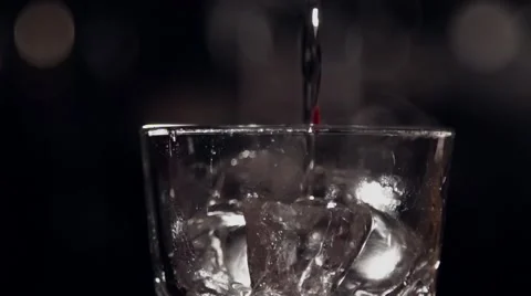 Pouring drink in slow motion Stock Footage 67866335