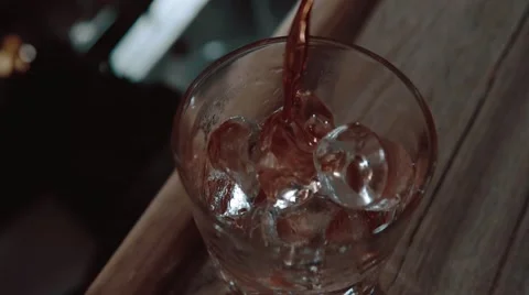 Pouring drink in slow motion Stock Footage 67867029