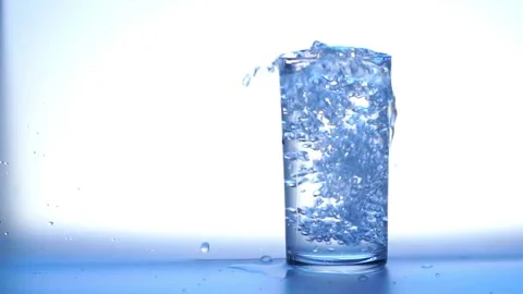 Pouring drinking water. Close up pouring purified fresh clean drinking water Stock Footage 265845862