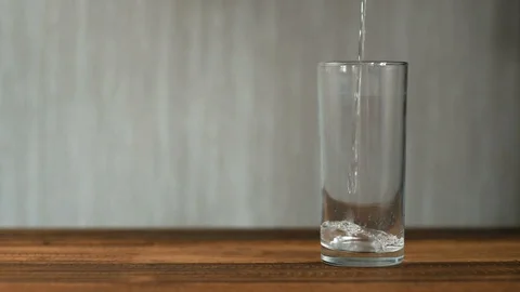 Pouring drinking water Stock Footage 86265009