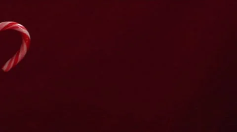 Pouring egg nog into a glass with a candy cane Stock-Footage 8574072