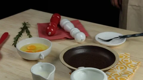 Pouring eggs on a bowl Stock Footage 118020037
