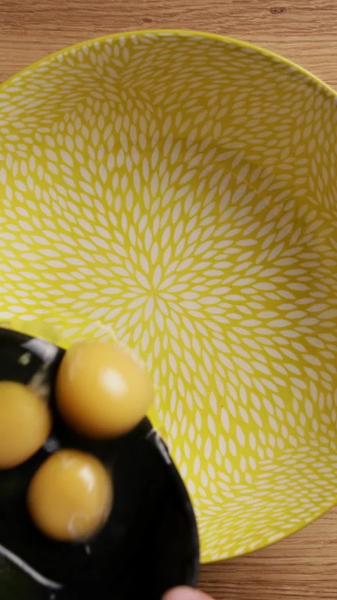 Pouring Eggs Into Bowl Top View Vertical Видео 337249137