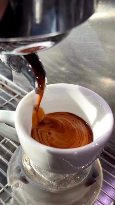Pouring Espresso Coffee into Cup Close Up Stock Footage 331570728
