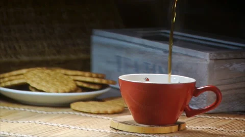 Pouring Evening Tea Into The Cup Video stock 64909732