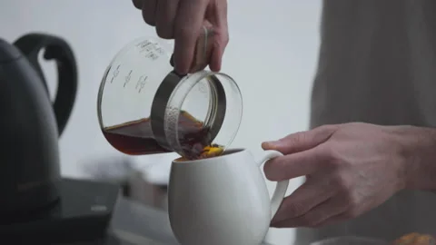Pouring filter coffee into a mug Stock-Footage 157460343