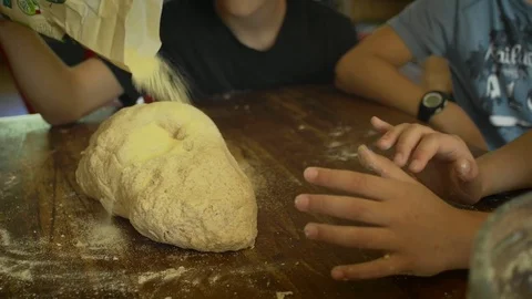 Pouring flour and kneading Stock Footage 77448524