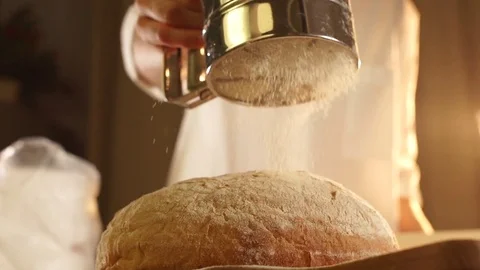 Pouring a flour to bread in slow motion Stock Footage 72318751
