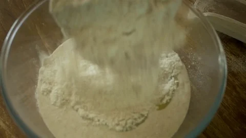 Pouring flour Stock Footage 76788378
