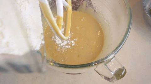 Pouring Flour into a Red Stand Mixer and Mixing Cookie Batter in 4k Stock Footage 101397798
