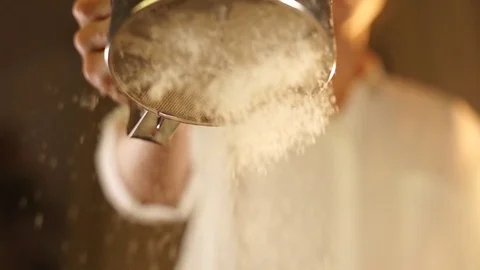 Pouring the flour in slow motion Stock Footage 72658941