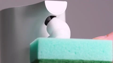 Pouring foam detergent from a dispenser. Stock Footage