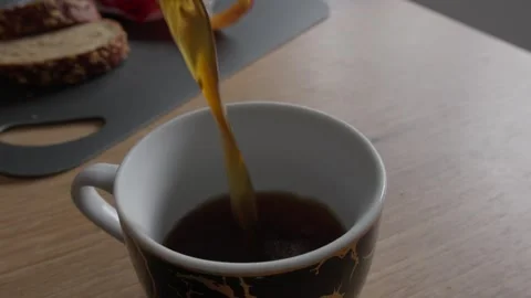 Pouring Fresh Coffee into a Cup Stock Footage 285566438