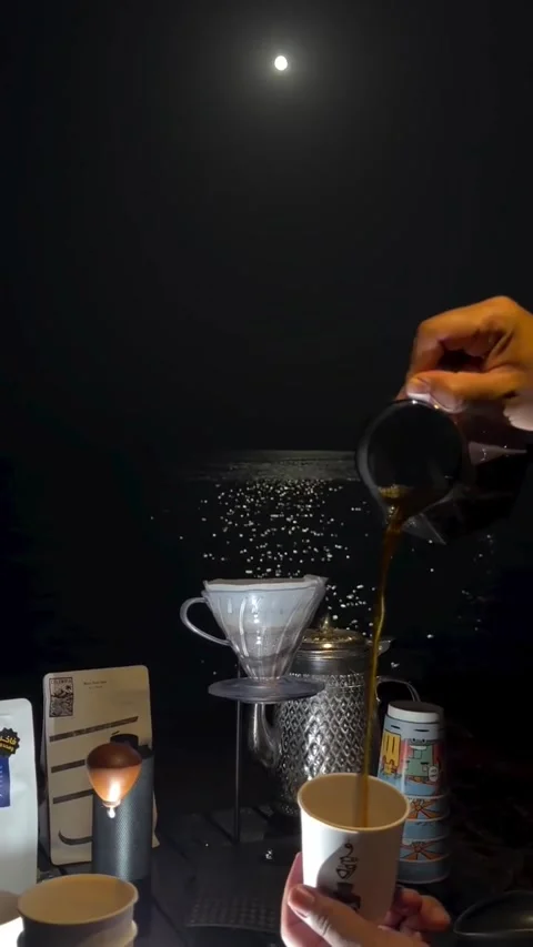 Pouring Fresh Coffee into Cup Under Moonlight Stock-Footage 342267608