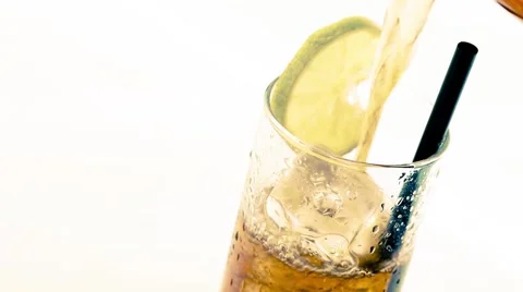 Pouring fresh coke with lime slice and ice cubes isolated on white Video stock 48924824