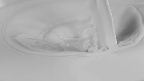 Pouring fresh milk in super slow motion, shooted with high speed cinema camera Stock Footage 101891790