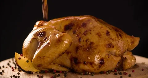 Pouring Fried Roasted Chicken with sauce closeup shot 4K Stock Footage 103258880