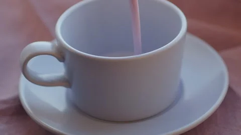 Pouring fruit yogurt. Slow motion Video stock 86012873
