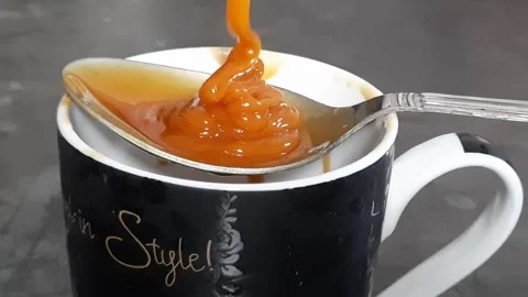 Pouring  gaggery(sweet) Stock Footage 140497133