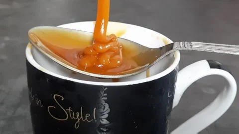 Pouring gaggery(sweet) slow motion Stock Footage 140497124