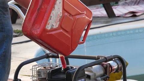 Pouring gas into a pump Stock Footage 106157631