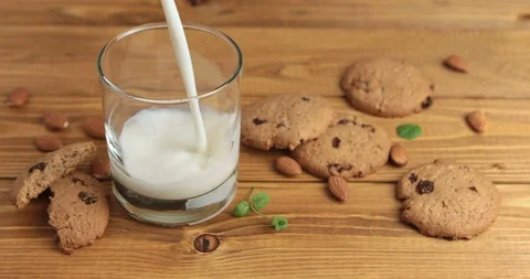 Pouring a glass of milk Stock Footage 94615403
