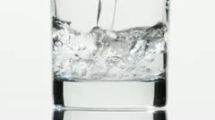 Pouring water into a glass - Stock Image - F006/7235 - Science