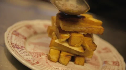 Pouring Gravy Over Poutine Stock Footage 42428601