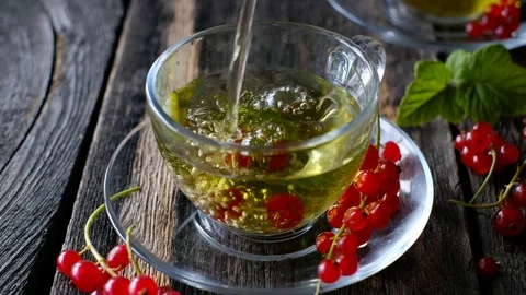 Pouring green tea Stock Footage 115569880