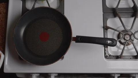 Pouring Greese Into Pan Stock Footage 86185065