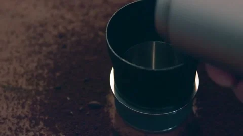 Pouring ground coffee beans Video stock 169260225