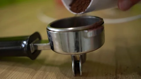 Pouring ground coffee from mill to filter holder. Close up shot 스톡 동영상 80129893