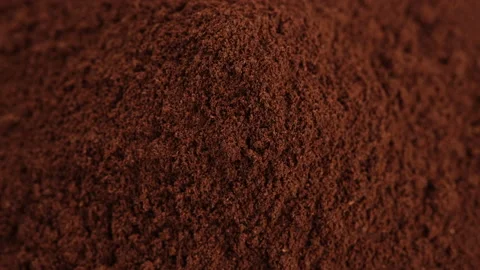 Pouring ground coffee top view, rotation. 4K UHD video Stock Footage 157706133