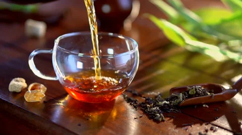 Pouring Healthy Tea. Slow Motion Video Footage Stock Footage