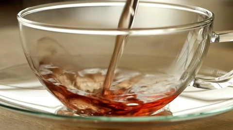 Pouring herbal fruit tea in slow motion Stock Footage 49248380