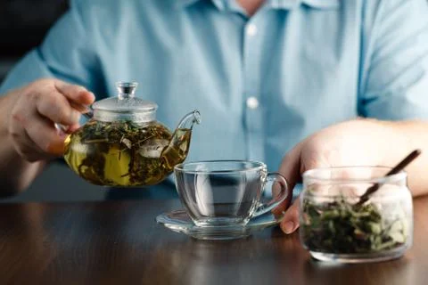 Pouring Herbal Tea Stock-Fotos