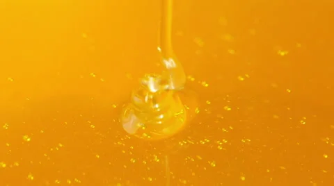 Pouring honey. Stock Footage 67379144