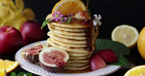 Pouring honey on a stack of pancakes Stock Footage 160172551