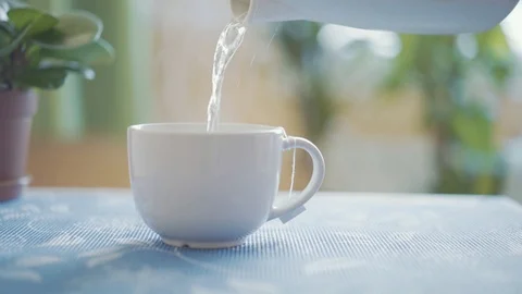 Pouring Hot Water Into Into Cup Stock Photo 1146657914