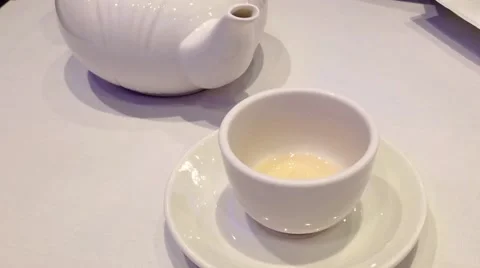 Pouring hot chinese tea inside Chinese restaurant Stock Footage 50361074
