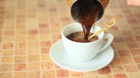 Pouring hot coffee from cezve Stock Footage 51722172