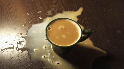 Pouring hot coffee into a mug in a bad mood. Reverse Stock Footage 117733809