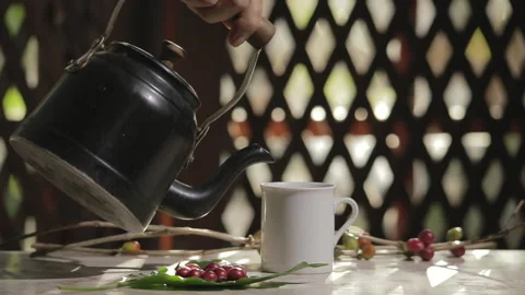 Pouring hot coffee in a mug. Stock Footage 130653151