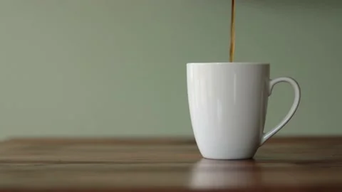Pouring a Hot Cup of Coffee Stock Footage